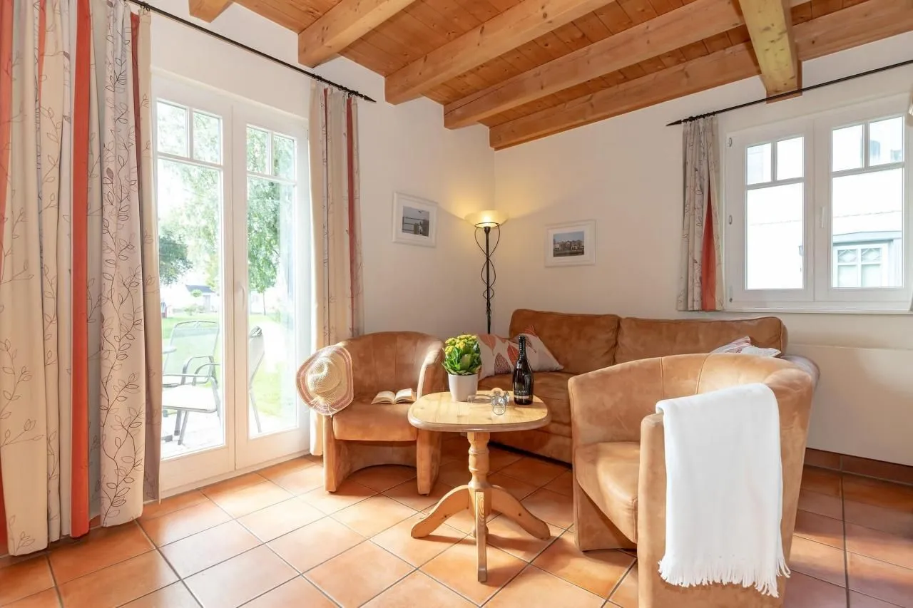 Wohnbereich mit Sofa und Sesseln